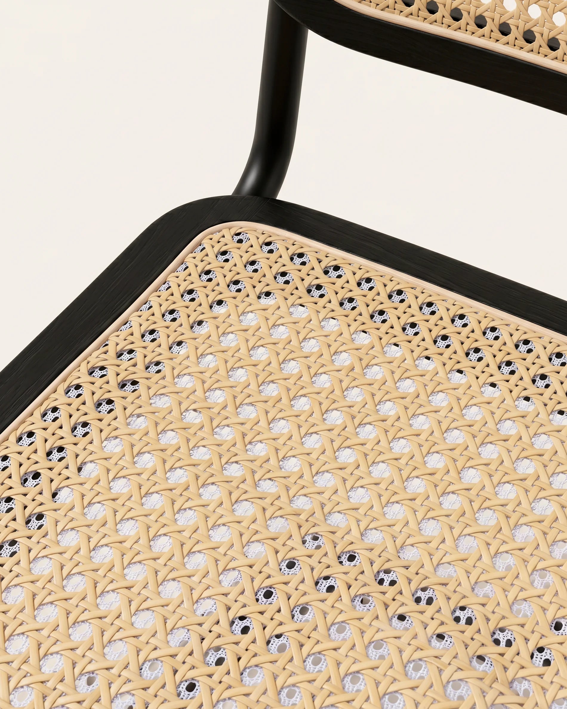 Detalle asiento ratán negro tejido cannage silla Breuer comedor Venhoouse Chile
