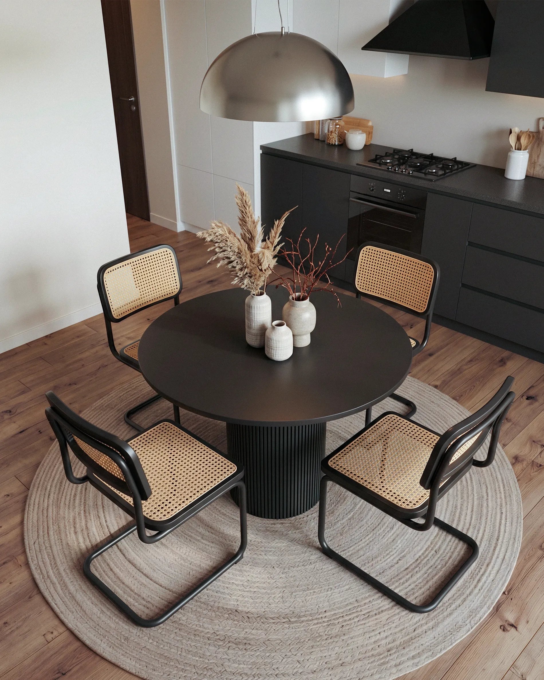 Silla Breuer ratán negra en comedor moderno elegante ambiente Venhoouse Chile
