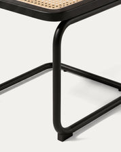 Detalle estructura cantilever acero cromado silla Breuer ratán negra Venhoouse Chile
