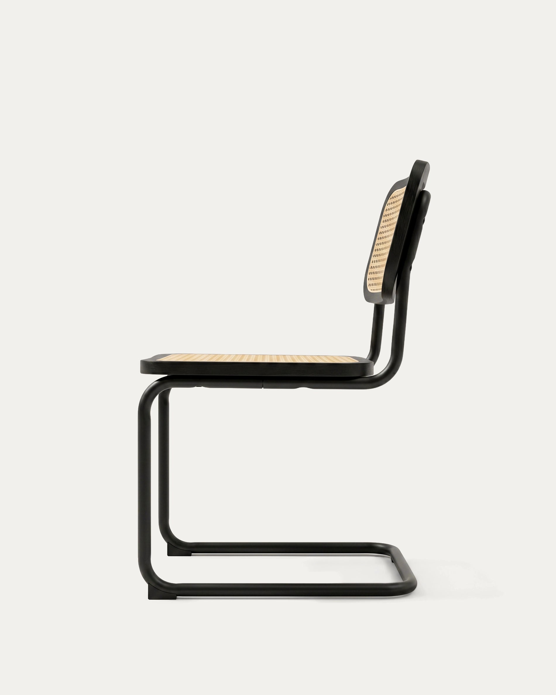 Silla comedor Breuer ratán negra perfil lateral cantilever acero Venhoouse Chile
